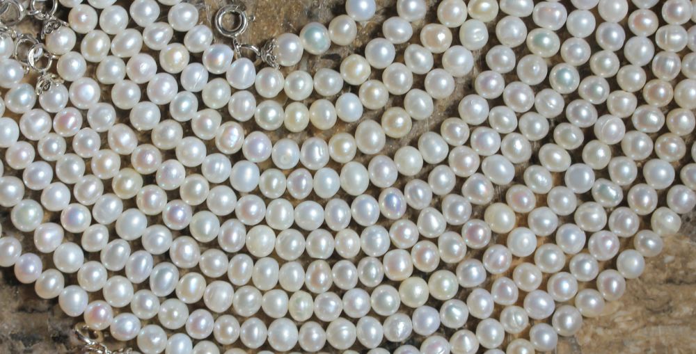 Бусы из жемчуга с золотыми вставками